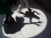 Children making shadow shapes